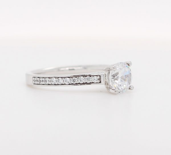 Samantha solitaire channel pave diamond ring